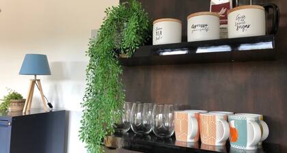 Warm modern retreat nestled by Rotorua’s Redwoods with cozy retro charm