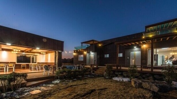 Front of property – evening/night - Jeju Courtyard Pension (Seogwipo)