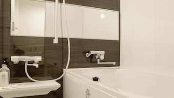 Separate tub and shower, free toiletries, hair dryer, bathrobes