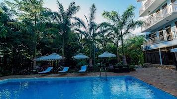 Outdoor pool, open 8:30 AM to 6:00 PM, pool loungers