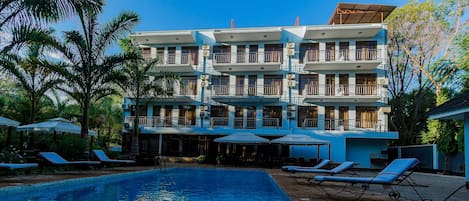 Outdoor pool, open 8:30 AM to 6:00 PM, pool loungers