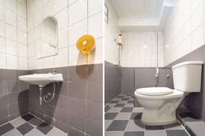 Habitación doble estándar | Baño | Regadera, toallas, jabón, shampoo