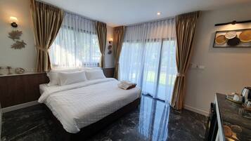 Habitación Deluxe | Caja de seguridad en la habitación, wifi gratis y ropa de cama