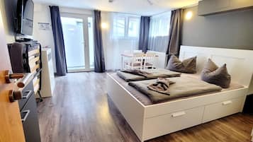 Economy Studio, 1 Bedroom, Non Smoking | Minibar, individually decorated, desk, free WiFi
