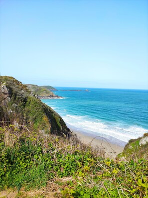 Beach nearby, sun loungers