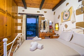 Traditional Villa, 4 Bedrooms | 4 bedrooms, in-room safe, laptop workspace, blackout curtains - Athina Traditional Villa (Chania)