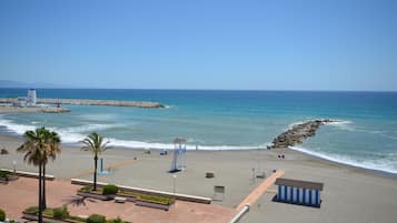 On the beach, beach towels