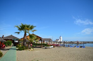 On the beach, beach towels