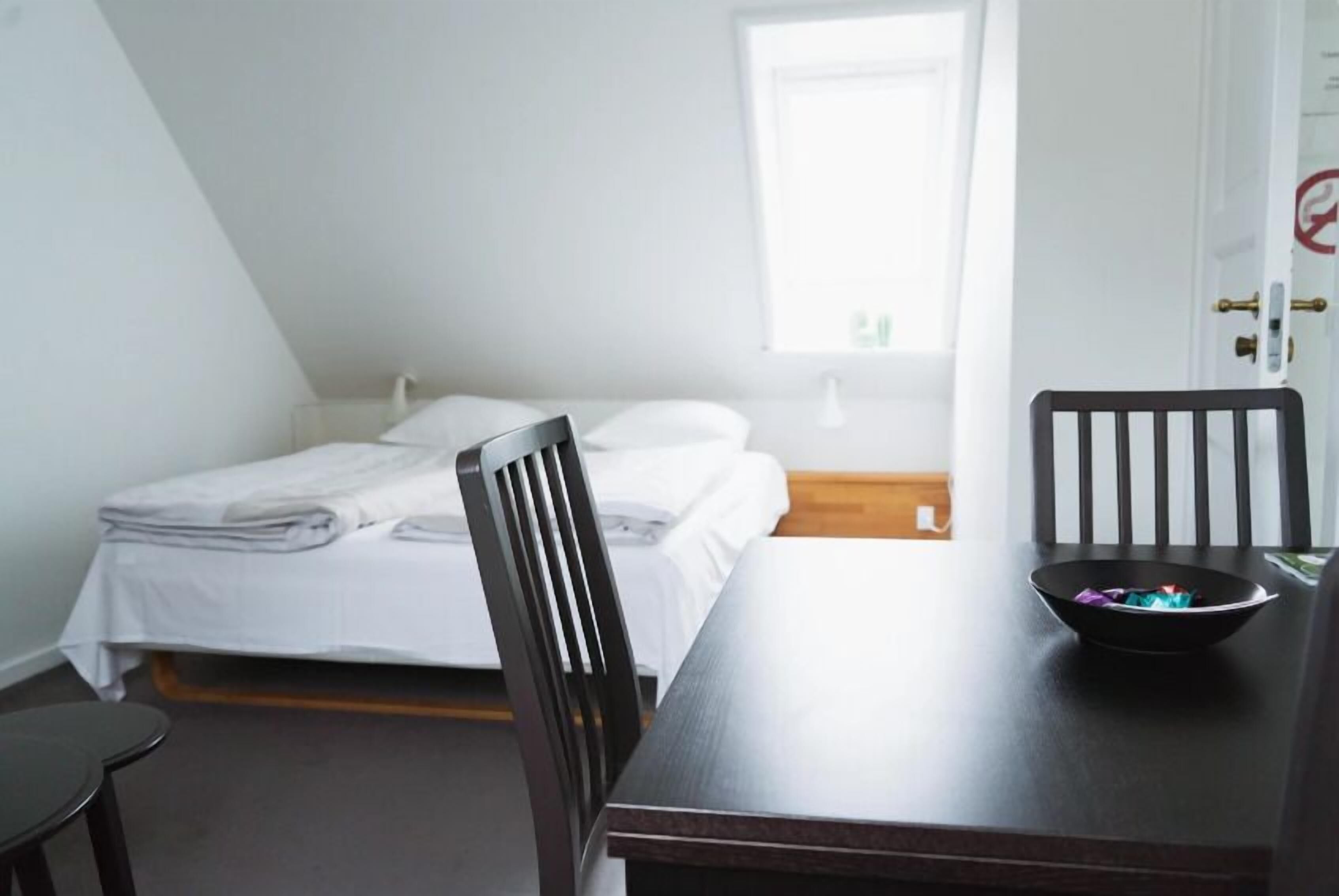 Premium bedding, down comforters, pillowtop beds, desk