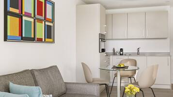 Suite, 1 Bedroom | Private kitchen | Full-sized fridge, microwave, oven, stovetop