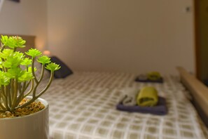 Apartment, 1 Bedroom | Desk, iron/ironing board, free WiFi, bed sheets