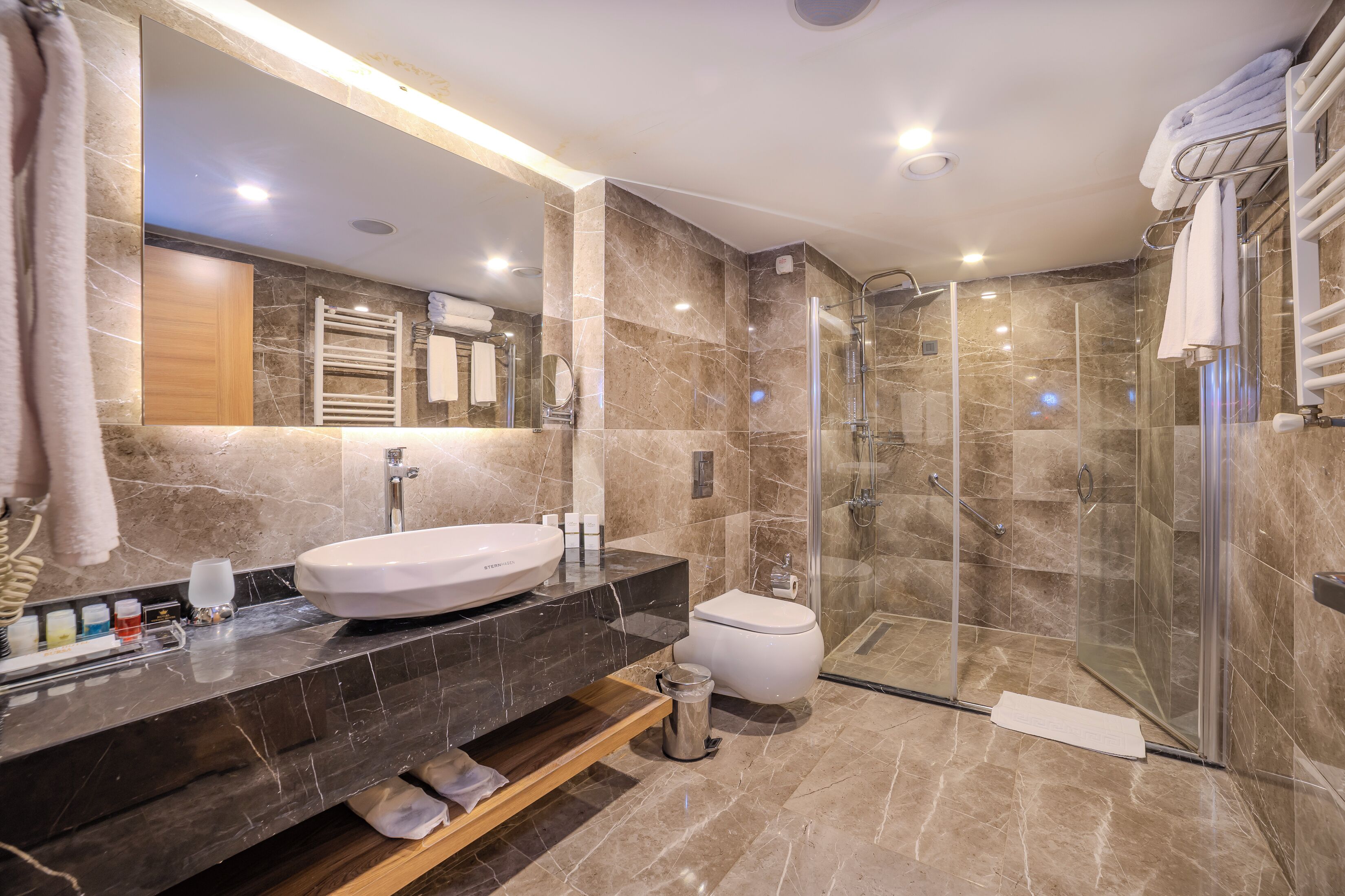 family room | 2 bedrooms, premium bedding, minibar, in-room safe