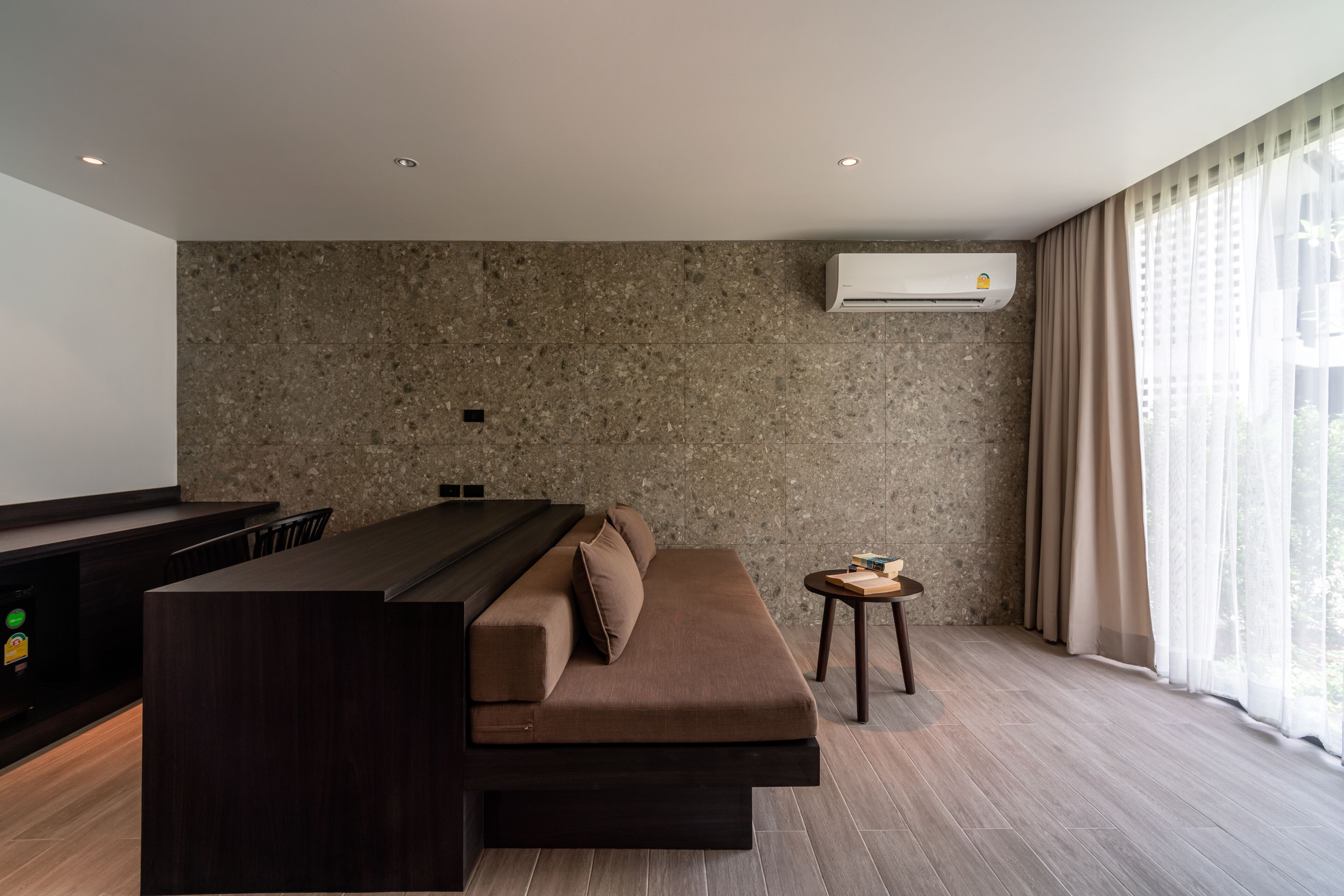 family room | 1 bedroom, minibar, in-room safe, desk