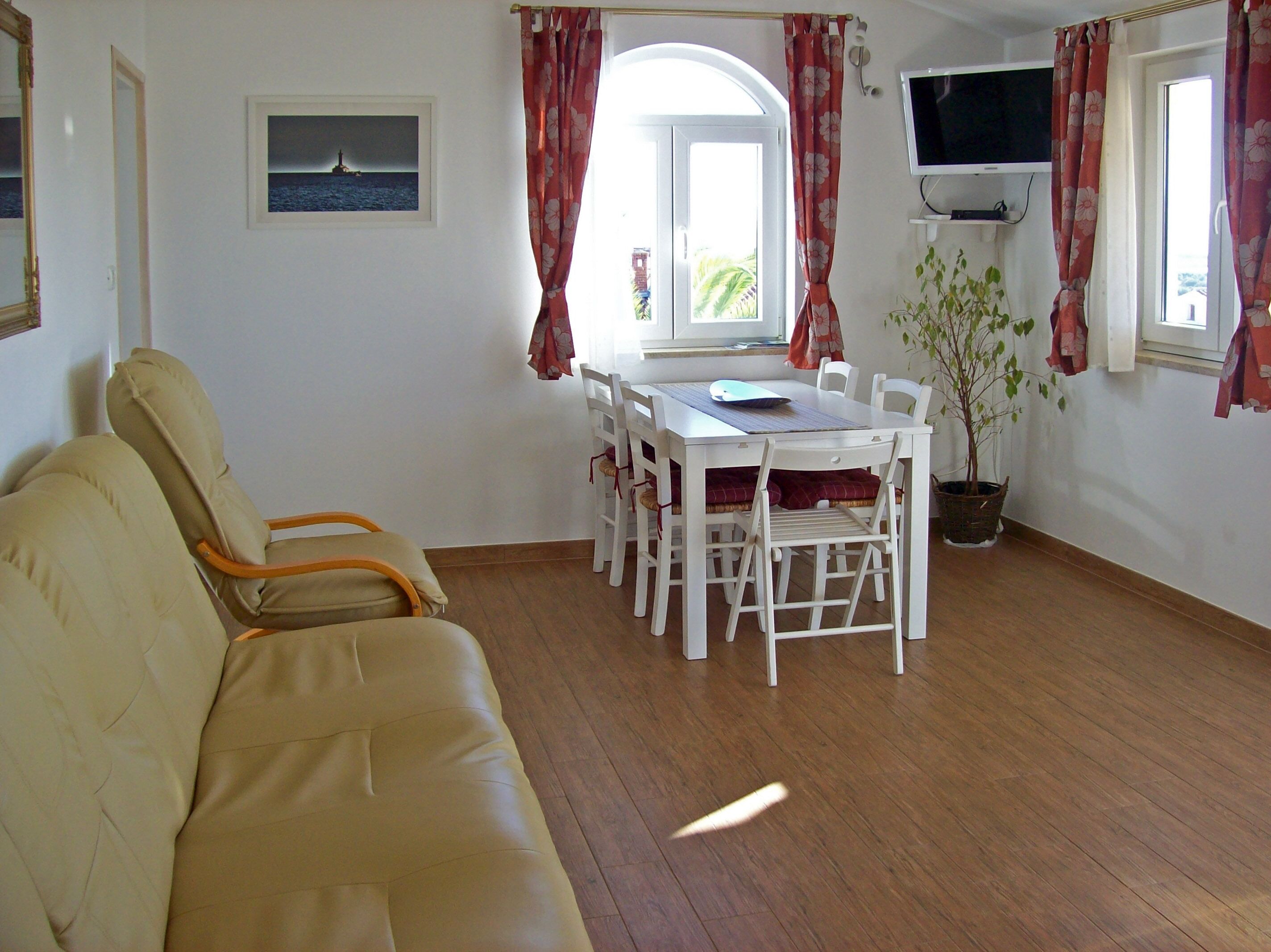 Apartment, 2 Bedrooms | Living area | Flat-screen TV