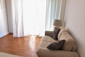 Apartment, 1 Bedroom | Living area | 21-inch flat-screen TV with digital channels, LCD TV - Torre a mare sun 2 (Bari)