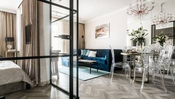 Apartment, 1 Bedroom | Living room | Flat-screen TV