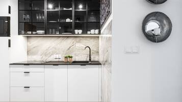 Apartment, 1 Bedroom | Private kitchen | Fridge, stovetop, dishwasher, electric kettle