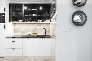 Apartment, 1 Bedroom | Private kitchen | Fridge, stovetop, dishwasher, electric kettle