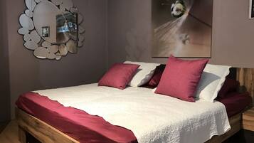 Family Apartment, Multiple Bedrooms | 3 bedrooms, in-room safe, iron/ironing board, free cots/infant beds