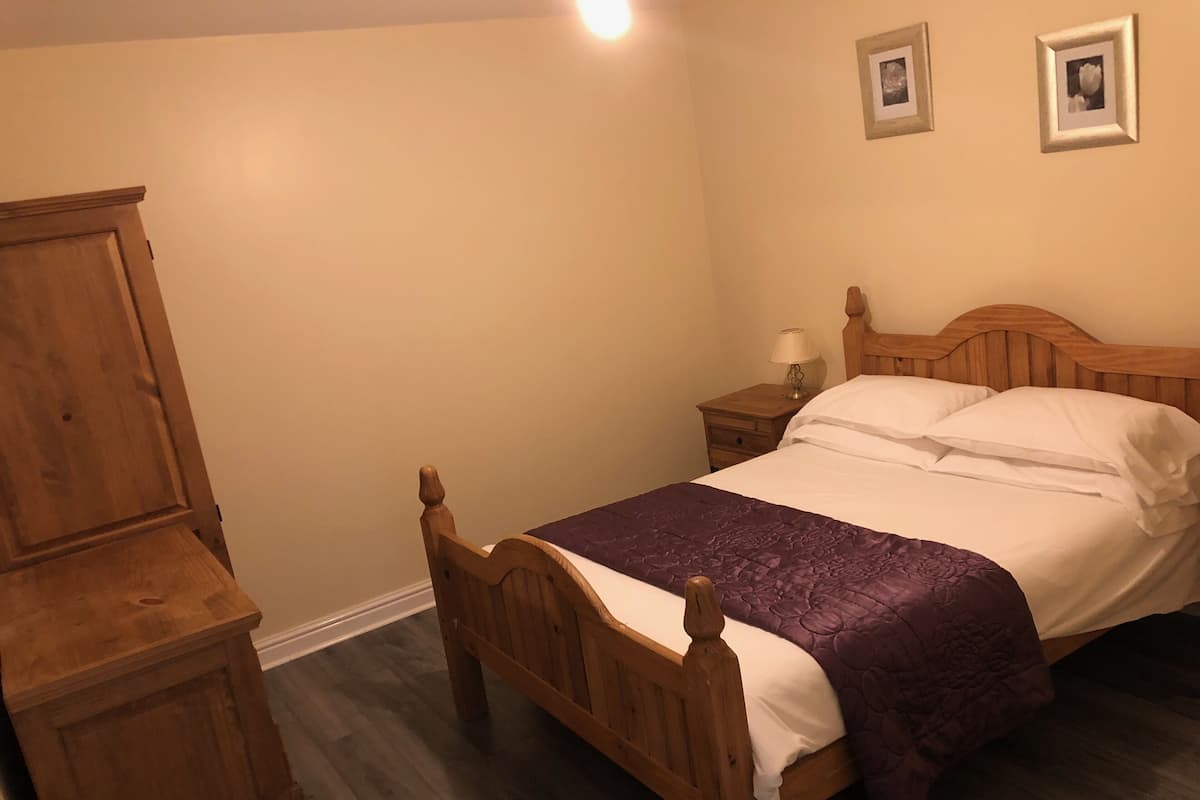 1 bedroom, blackout drapes, soundproofing, iron/ironing board