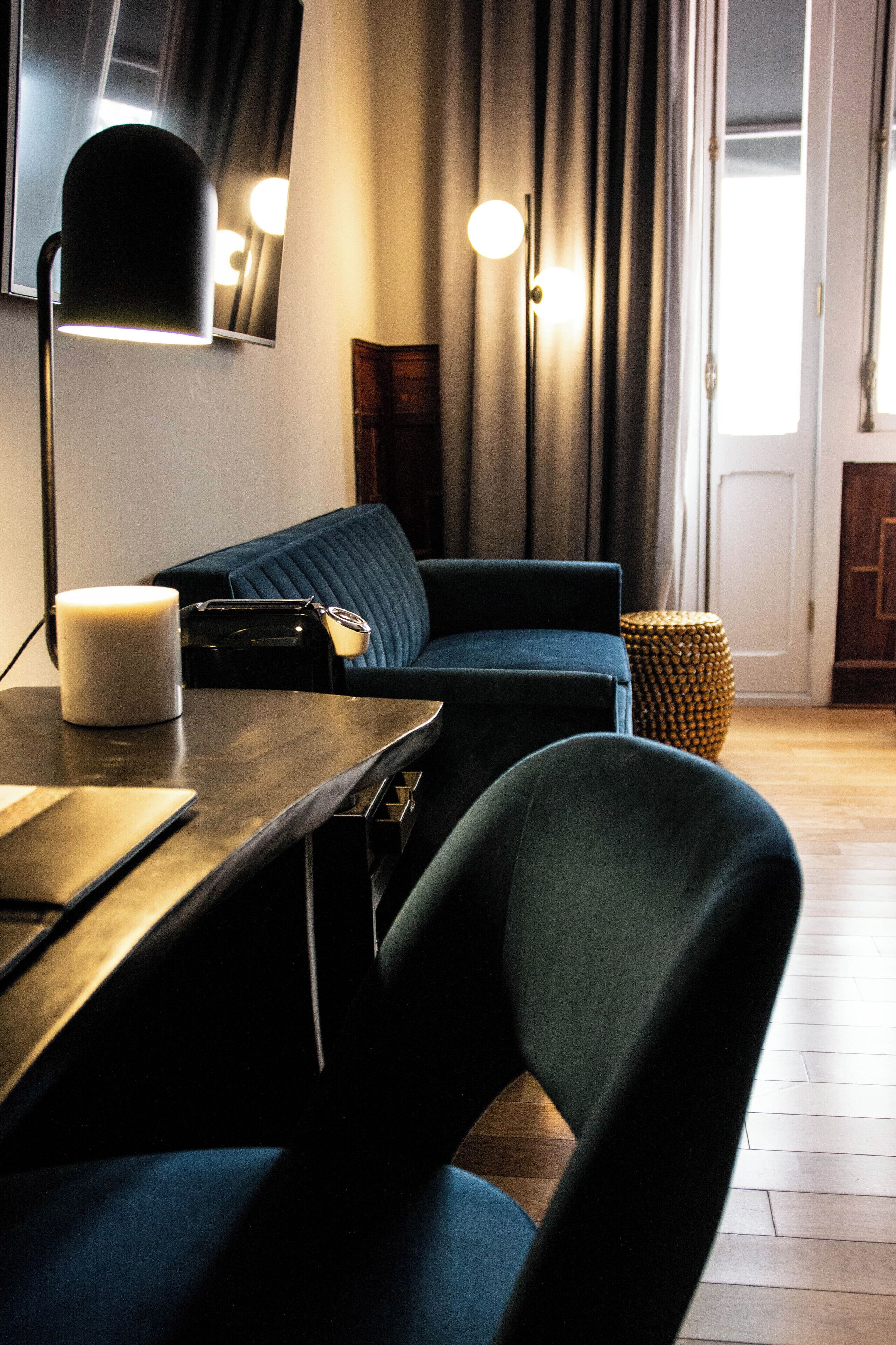 deluxe room | living area | 32-inch smart tv with satellite channels