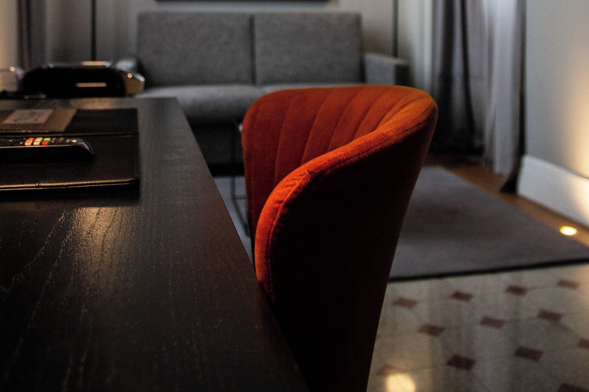 deluxe room | living area | 32-inch smart tv with satellite channels