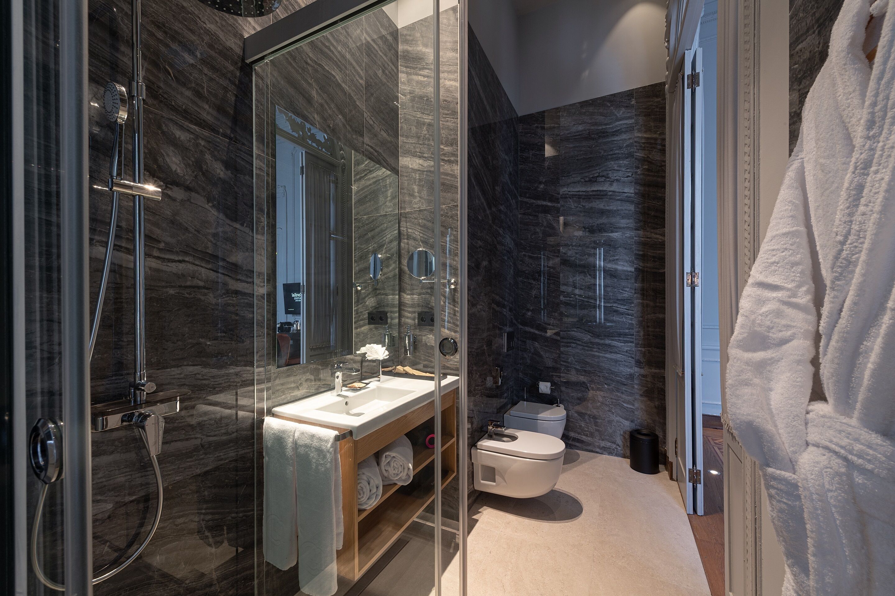 superior room | bathroom | shower, rainfall showerhead, hair dryer, towels