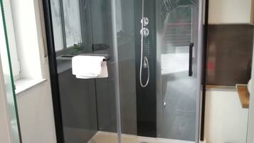 Hair dryer, towels, soap, shampoo