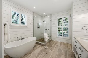 Bathtub, hair dryer, towels
