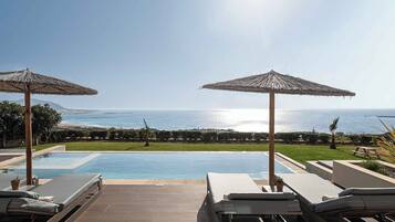 Villa Mare | Pool | 3 outdoor pools, a heated pool, pool umbrellas, sun loungers