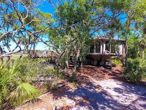 A gazebo surrounded by trees and a gravel path. - Secluded 2 Bedroom Treehouse w/Spectacular Marsh Views, 873 Fiddlers Ridge (Fripp Island)
