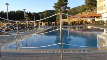 Seasonal outdoor pool, open 10:00 AM to 5:00 PM, sun loungers