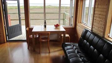 Cottage, 1 Bedroom | Living area | Flat-screen TV