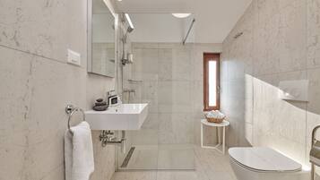 Shower, free toiletries, hair dryer, towels