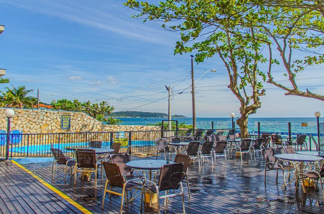 On the beach, white sand, sun-loungers, beach towels