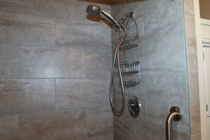Shower, hair dryer, towels, toilet paper
