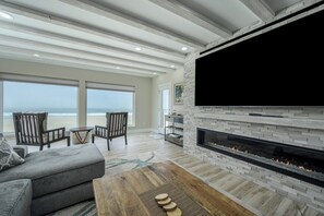 Smart TV, fireplace, books