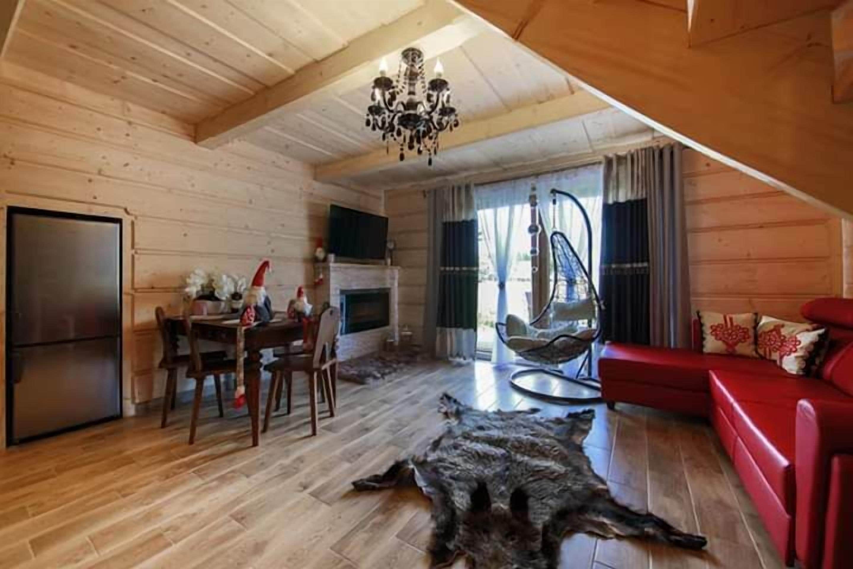 Deluxe Chalet, 3 Bedrooms | Living area | LED TV, toys