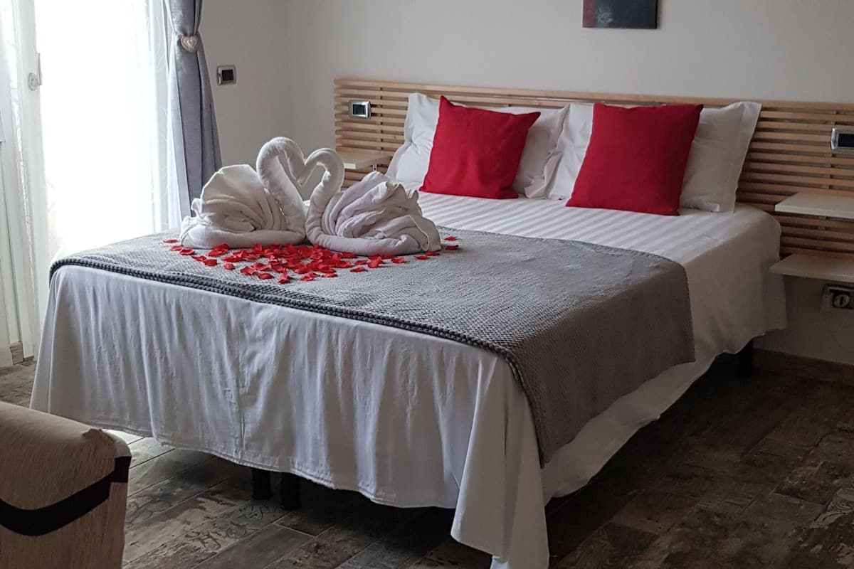 Chambre familiale | Draps italiens de Frette, literie de qualité, couette en duvet