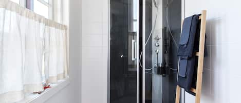 Deluxe Double Room | Bathroom | Shower, rainfall showerhead, hair dryer, heated floors