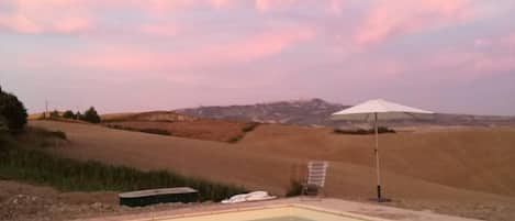 Seasonal outdoor pool, pool umbrellas, sun loungers