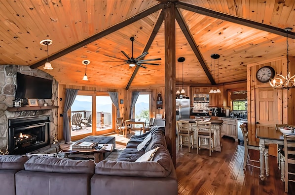 Smart TV, fireplace, books, stereo