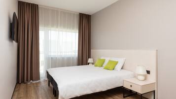 Blackout curtains, soundproofing, free WiFi, bed sheets