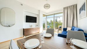 Apartment (53 A) | Living area | Flat-screen TV, DVD player - Sun & Snow Bałtyk Park Kołobrzeg (Kolobrzeg)