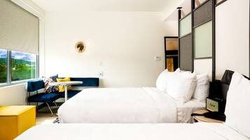 Premium bedding, pillow-top beds, in-room safe, laptop workspace