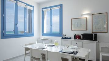 Apartment, 3 Bedrooms | Living area | Flat-screen TV