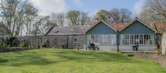 2 self-catering cottages booked as one with secure garden area.