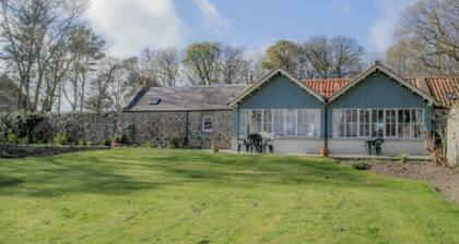 2 self-catering cottages booked as one with secure garden area.