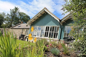 Exterior - 2 self-catering cottages booked as one with secure garden area. (Whitehills)