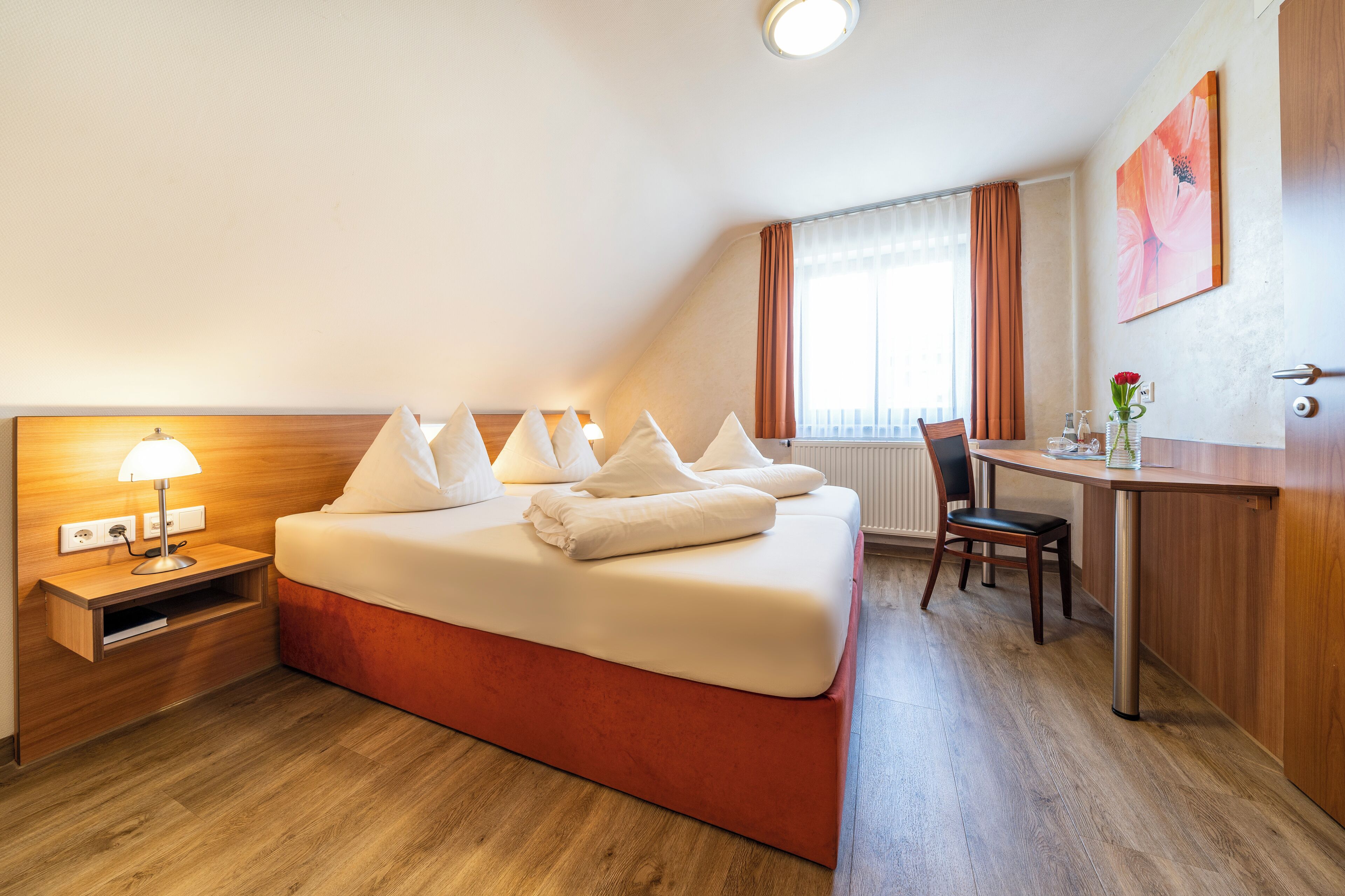 double room, mountain view | living area | tv, heated floors